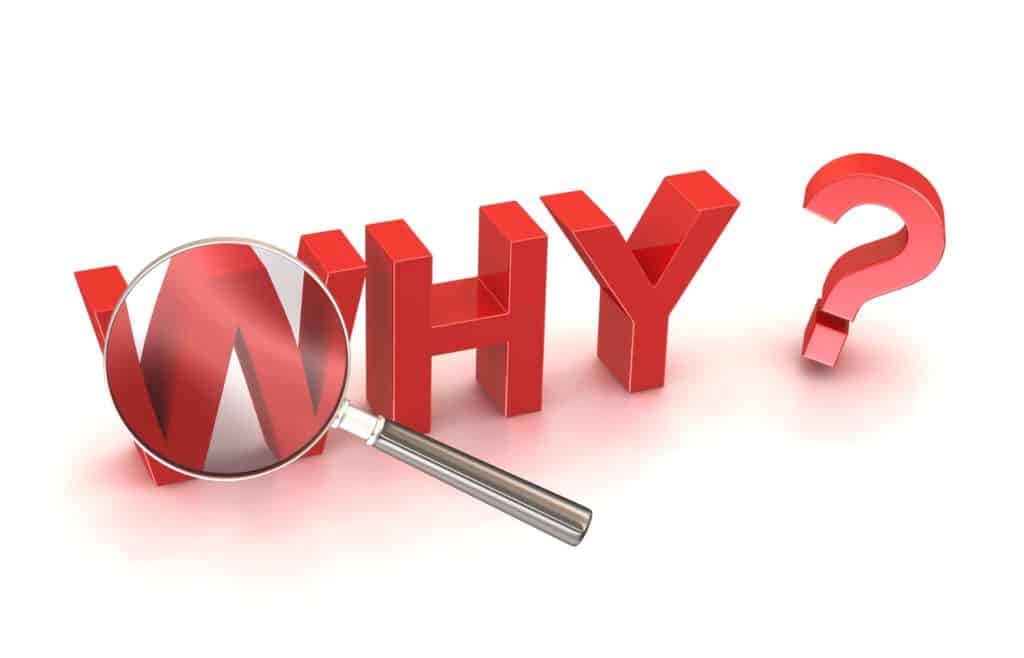 the word why with magnifying glass